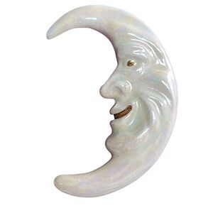 Vintage 1980s white glazed iridescent ceramic man on the crescent moon brooch